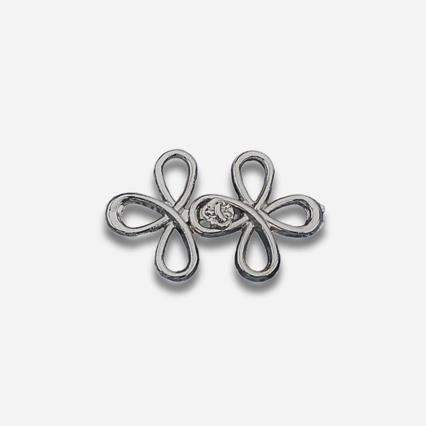 Gun black sculpted waist knot on a light gray background