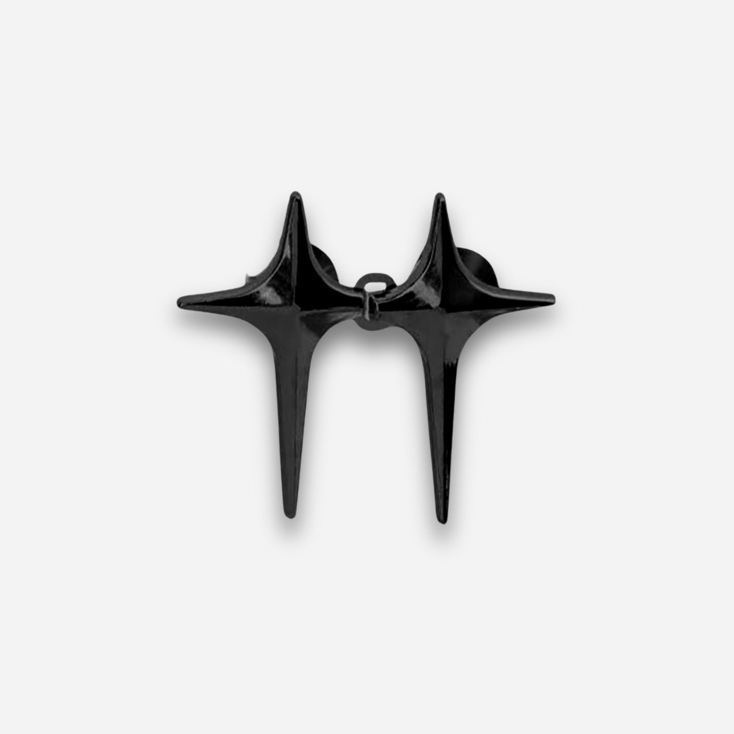 Black spike-like waist knots on a white background