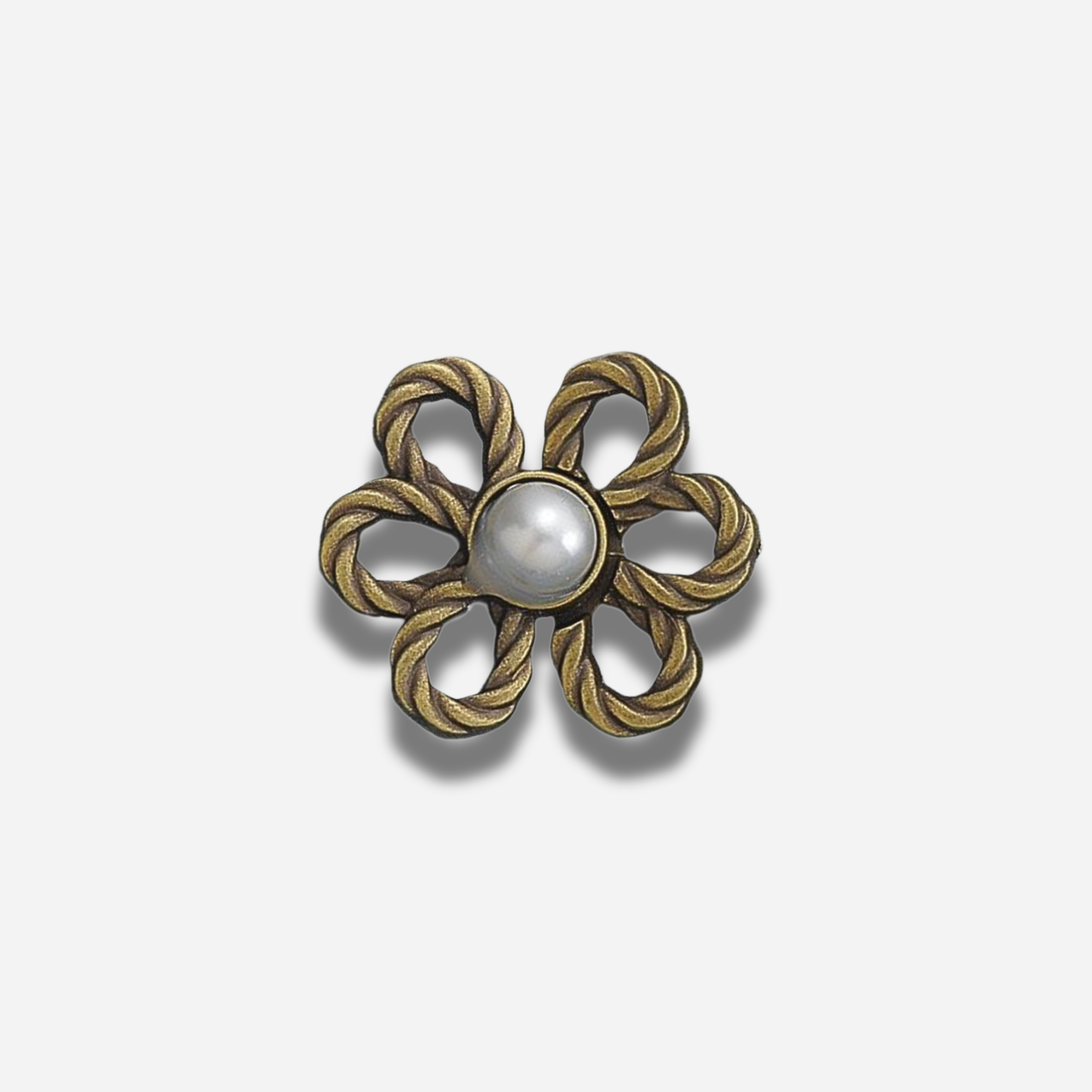 Antique gold pearl waist knot on a light gray background