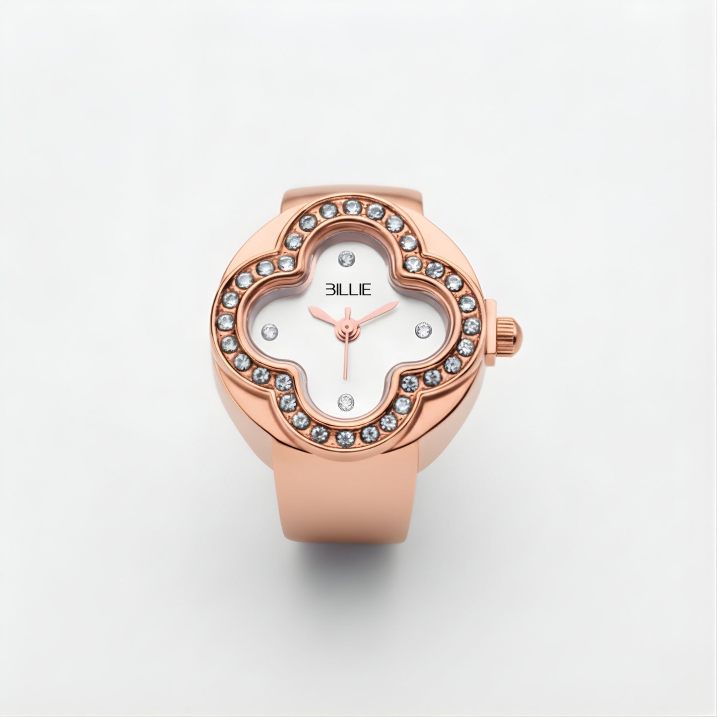 Roségouden horloge met edelsteenaccenten op een lichtgrijze achtergrond