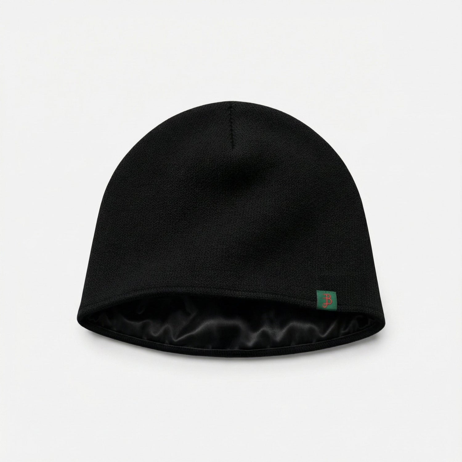 Black satin-lined beanie with Billie Jeans logo on light gray background