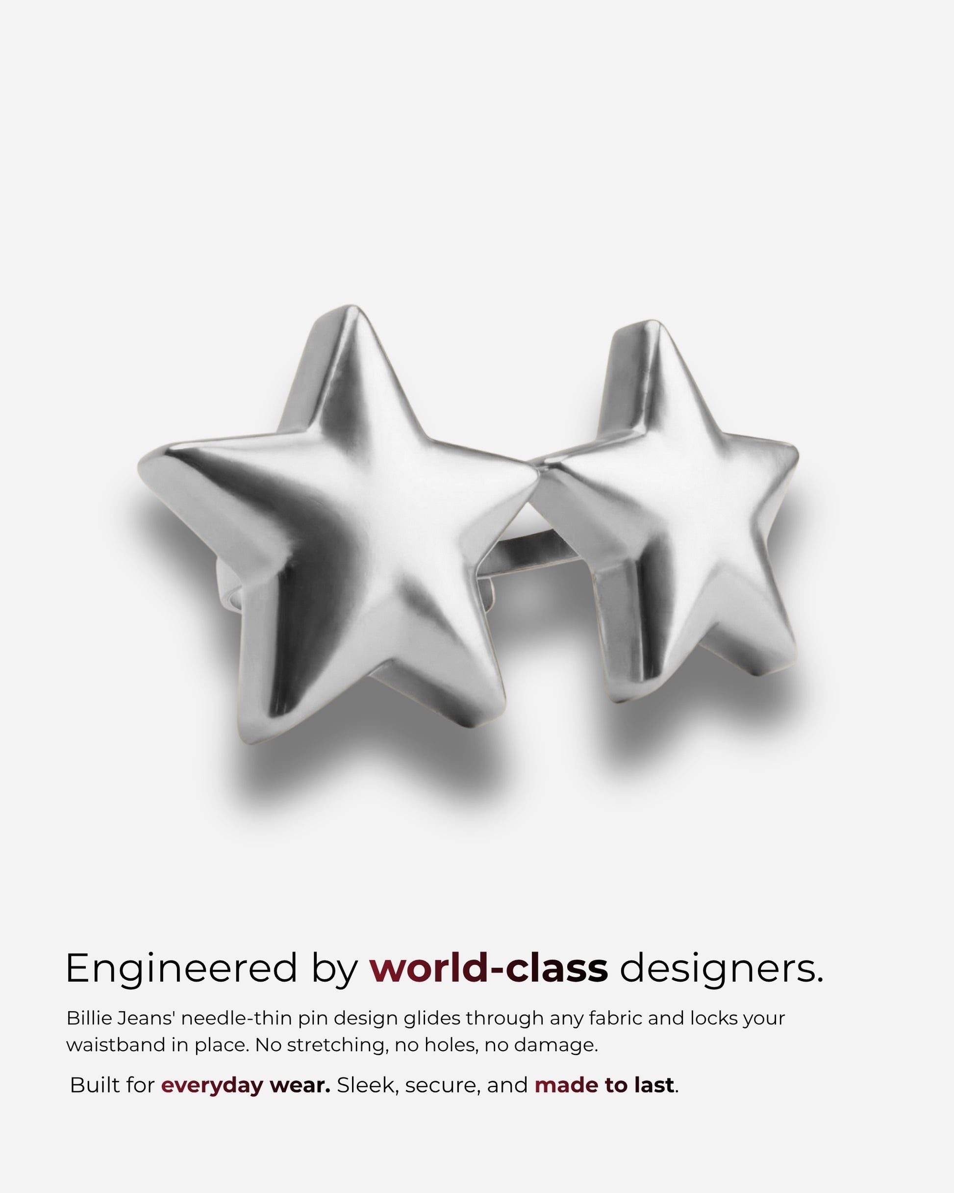 Two silver star-shaped accessories on a plain background.