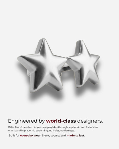 Two silver star-shaped accessories on a plain background.