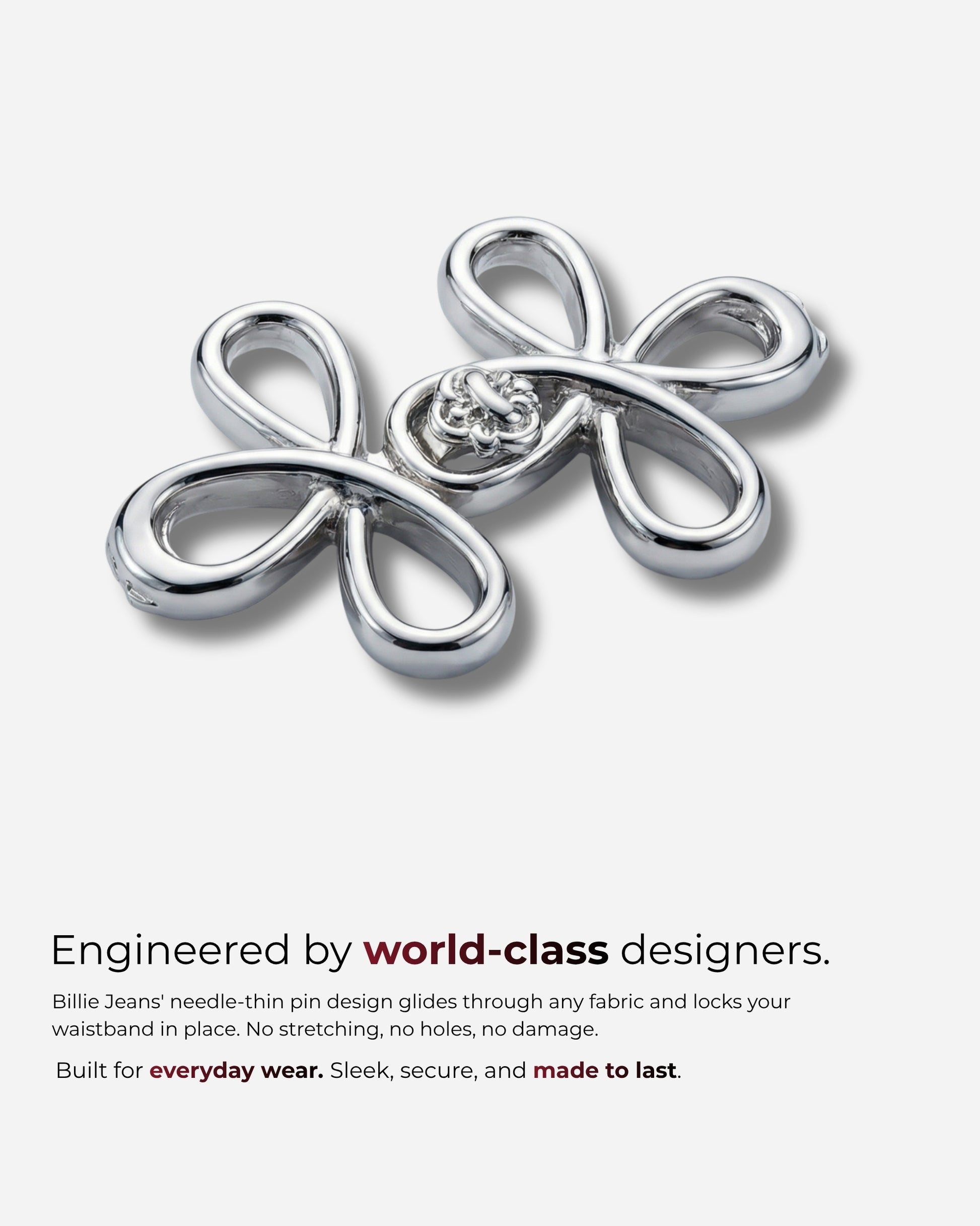 Two silver decorative pins with a loop design on a white background.