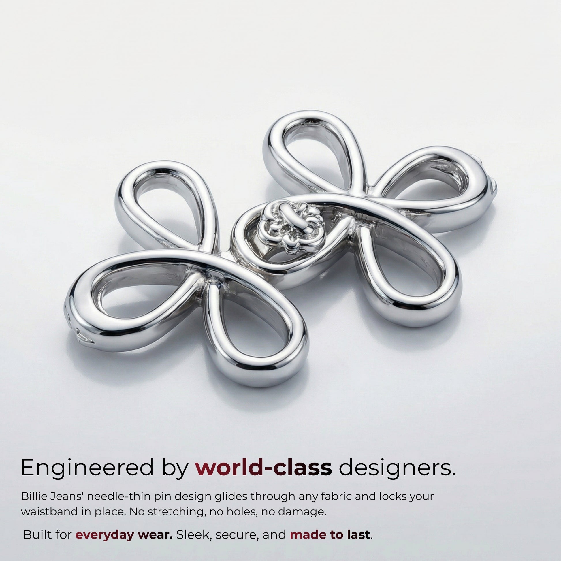 Billie Jeans chrome silver ornamental jeans pin with four looped petals and rosette center
