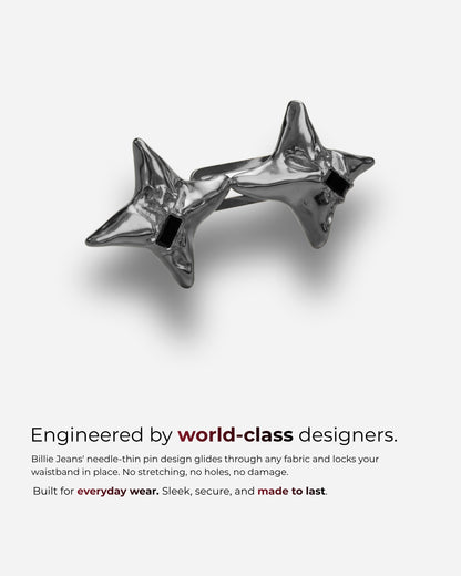 Two star-shaped metallic objects on a plain background.