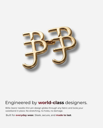Gold pin design with interlocking letters B and J on a plain background.