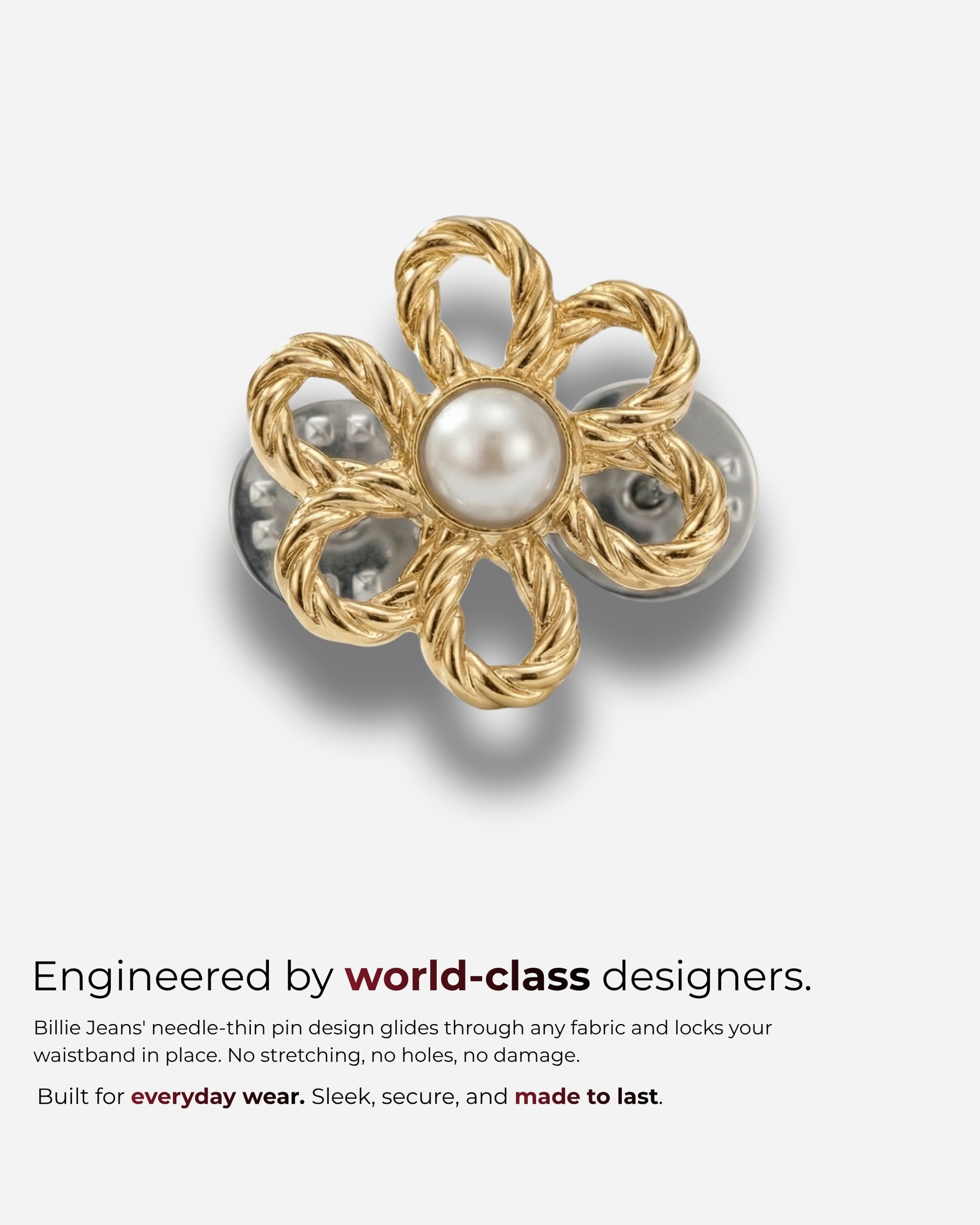 Gold flower-shaped pin with a pearl center on a light background.
