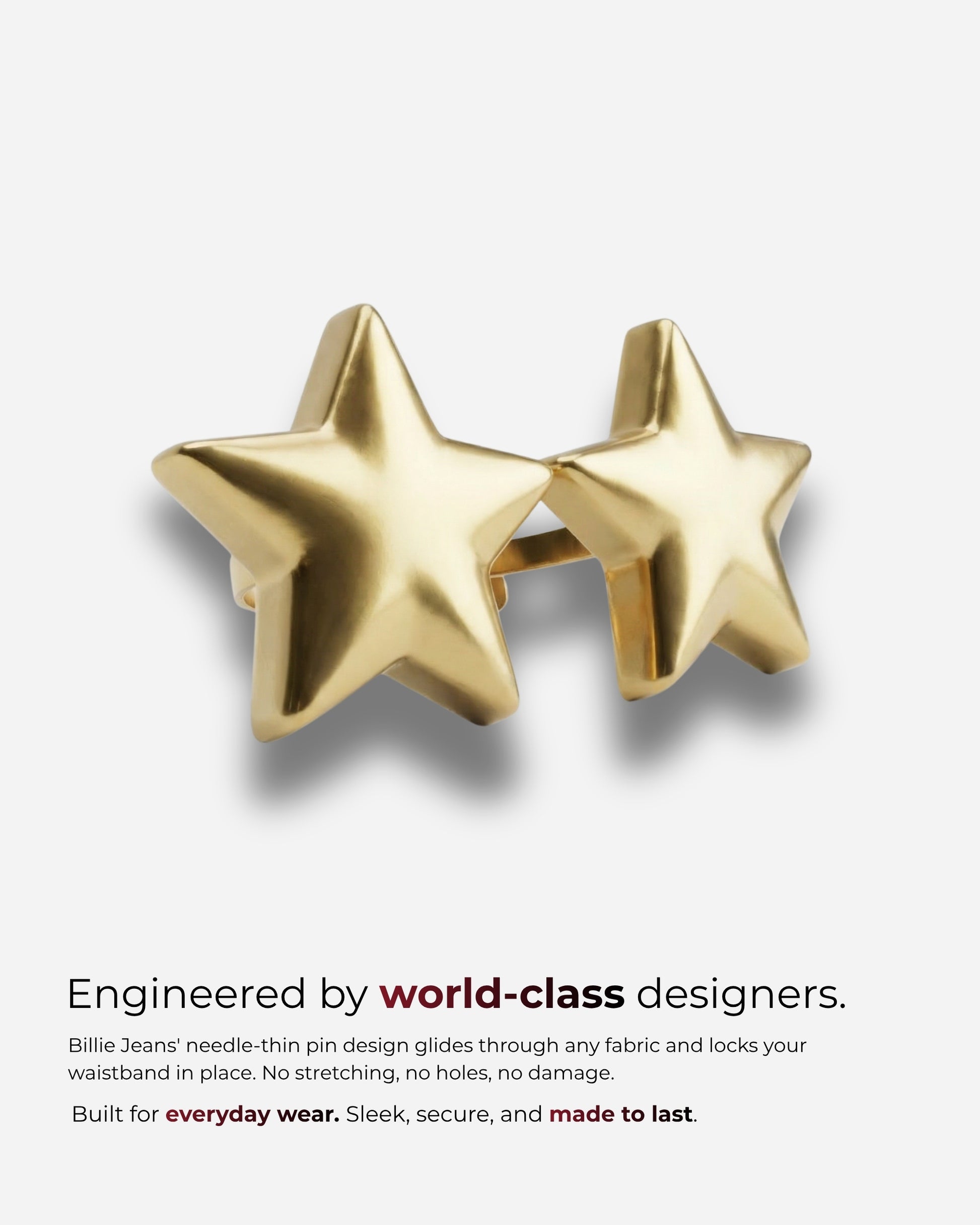 Two gold star-shaped accessories on a light background.