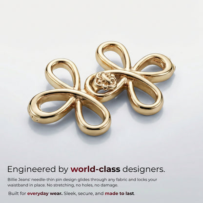 Billie Jeans polished gold ornamental jeans pin with four looped petals and rosette center