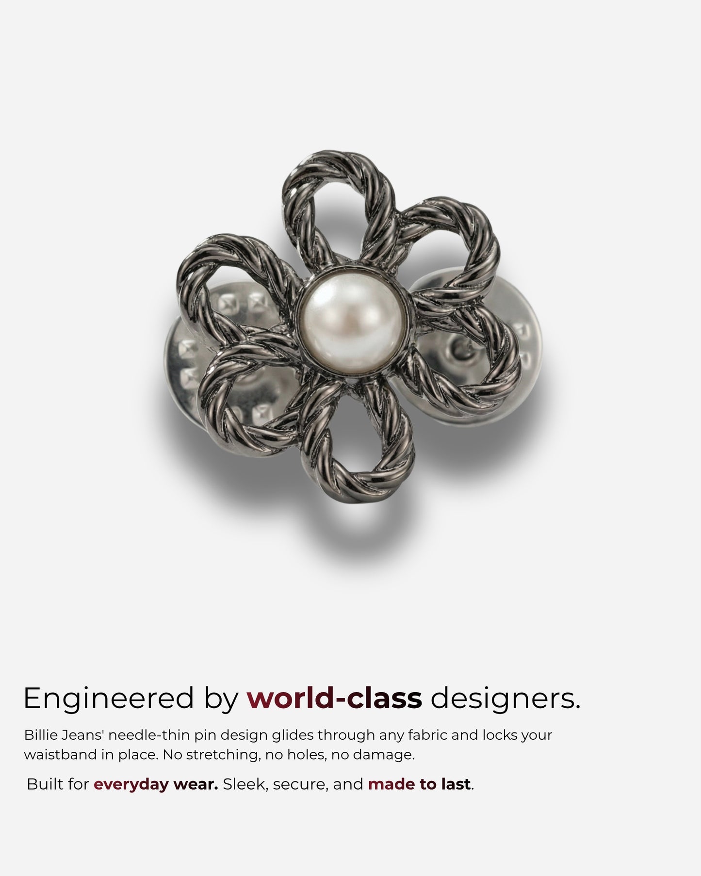 Metal flower-shaped pin with a pearl center on a plain background.