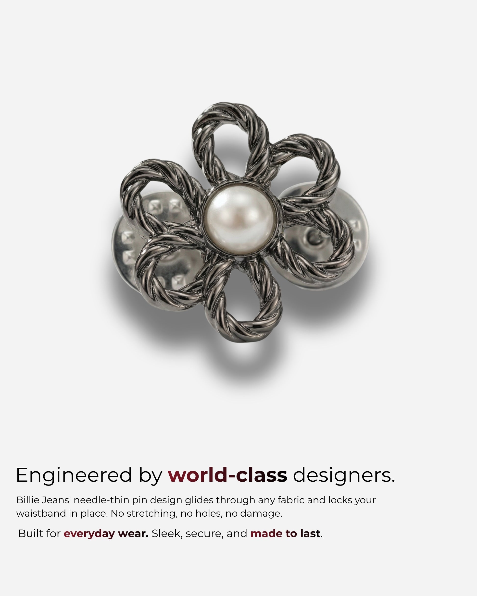 Metal flower-shaped pin with a pearl center on a plain background.