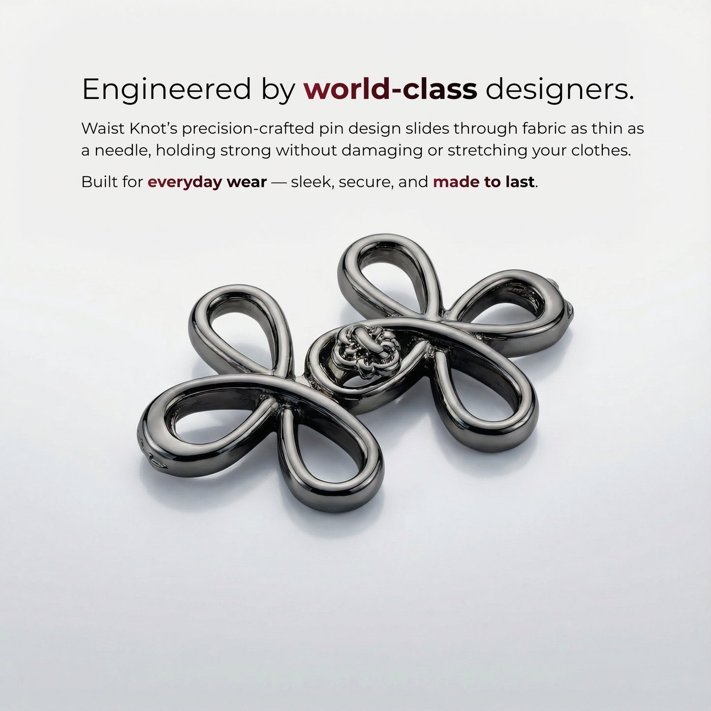 Silver brooch on a light gray background with text about world-class designers and everyday wear.