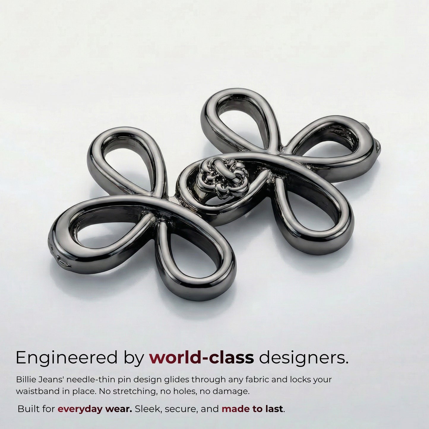 Billie Jeans gunmetal ornamental jeans pin with four looped petals and rosette center