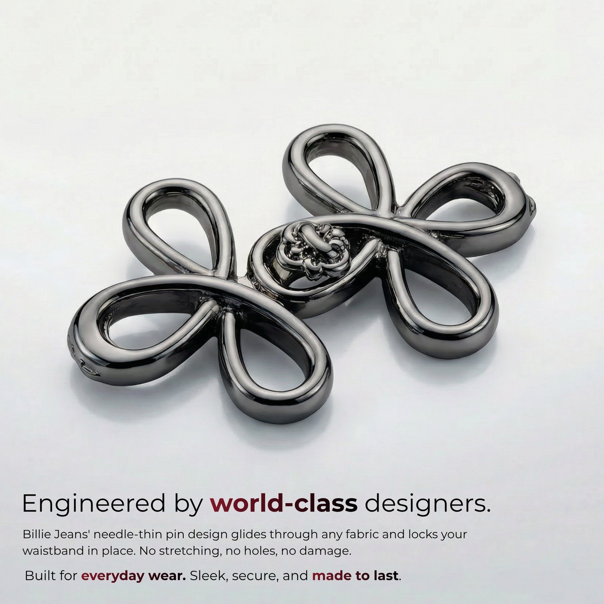 Billie Jeans gunmetal ornamental jeans pin with four looped petals and rosette center