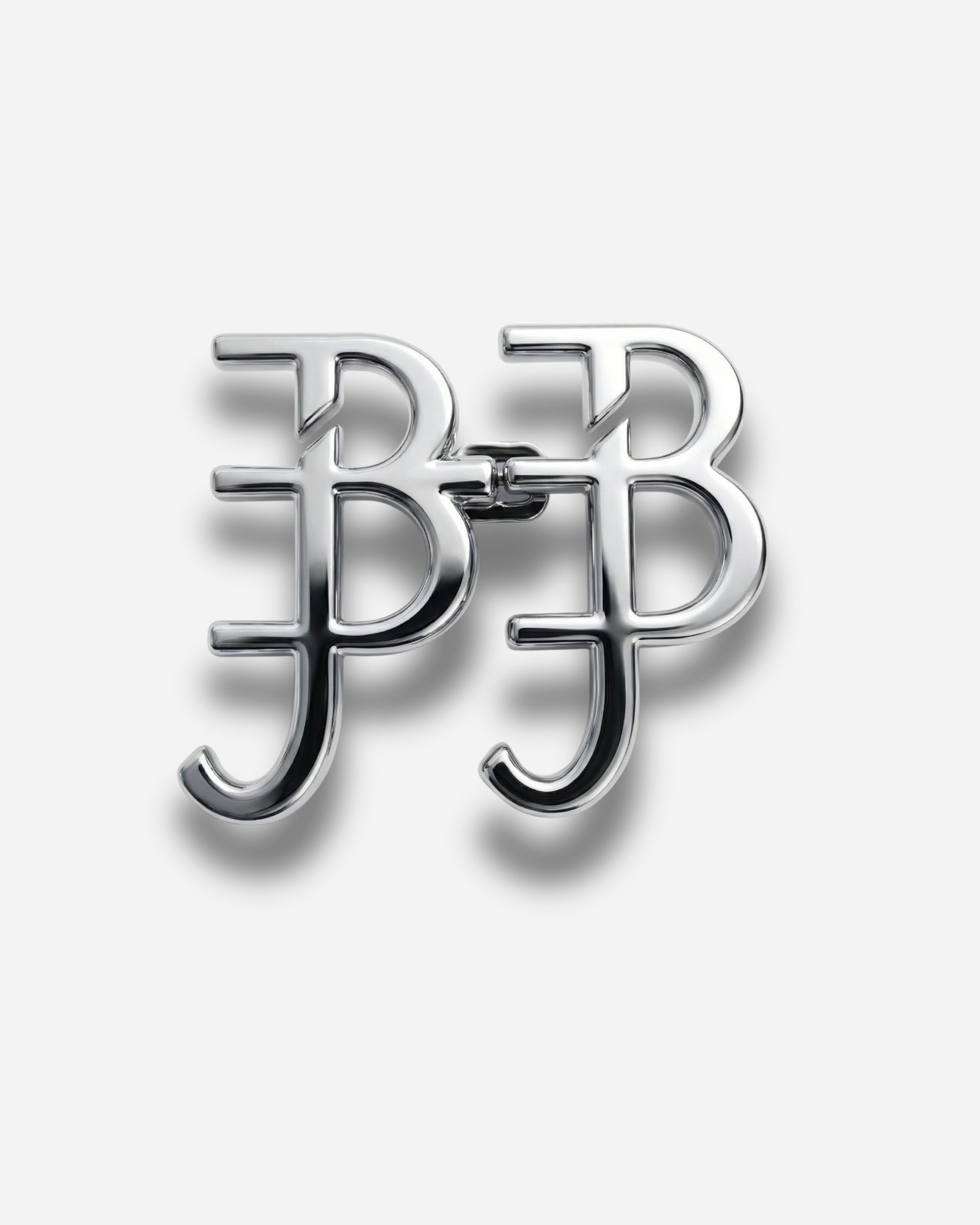 Silver logo featuring intertwined letters B and J on a plain background.