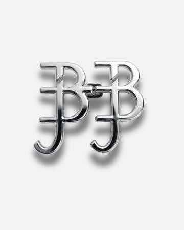 Silver logo featuring intertwined letters B and J on a plain background.