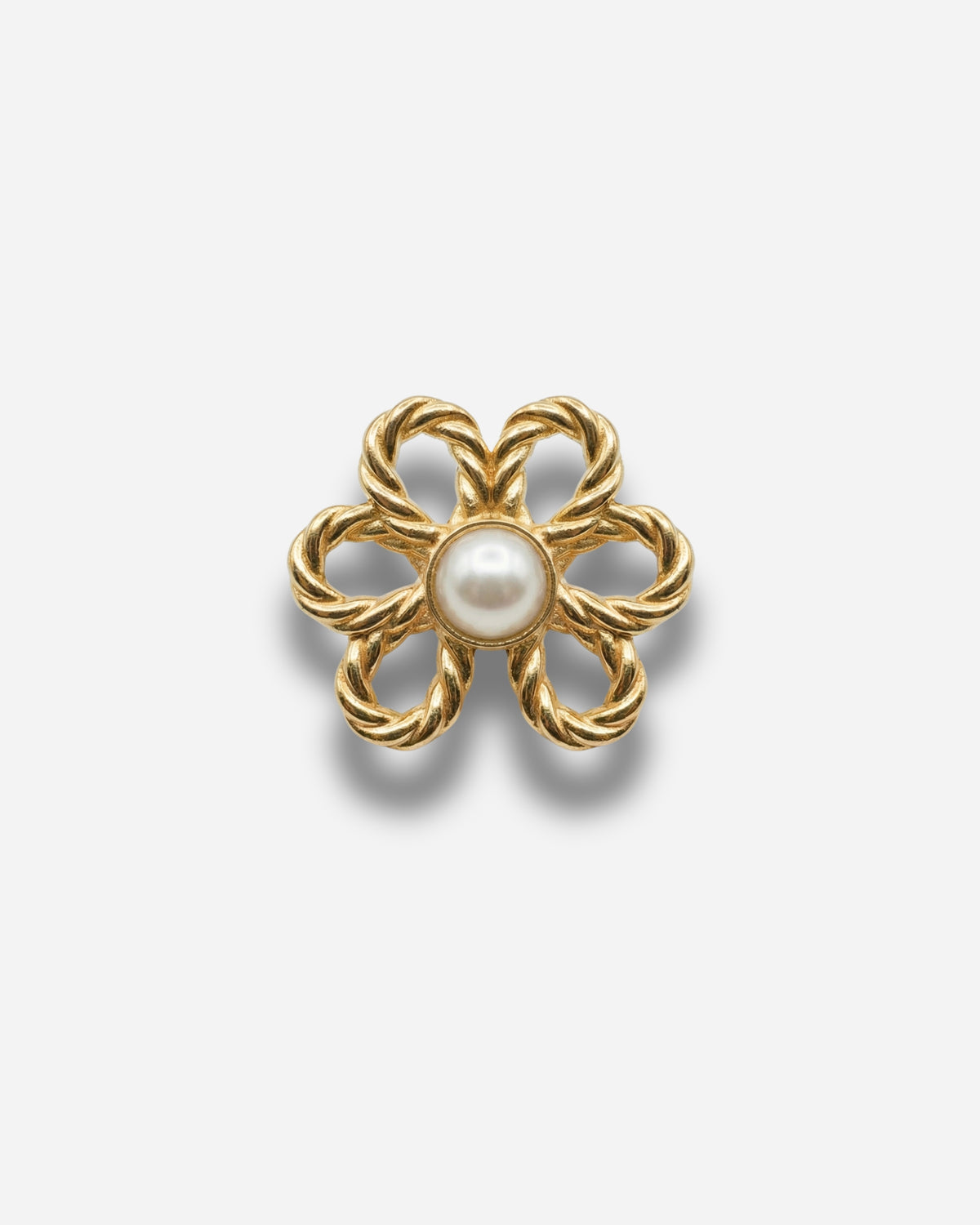 Billie Jeans Pins Pearl jeans pins in gold, two twisted-rope flower pins with a pearl centre with butterfly clasps, front view on a light background
