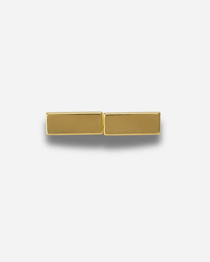 Two rectangular gold pieces on a plain white background