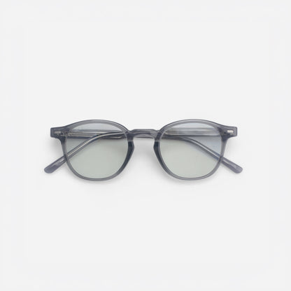 Round sunglasses with a gray frame on a white background