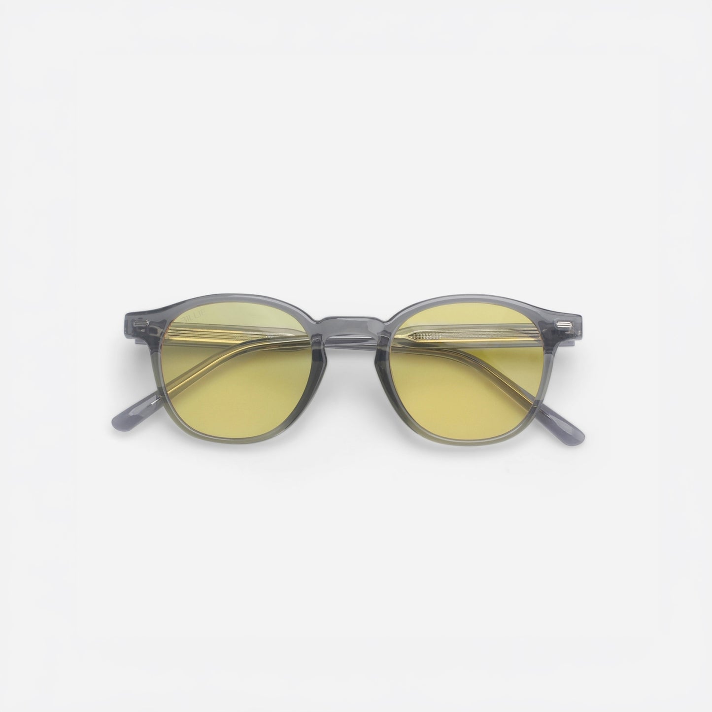 Round sunglasses with yellow lenses and gray frames on a white background