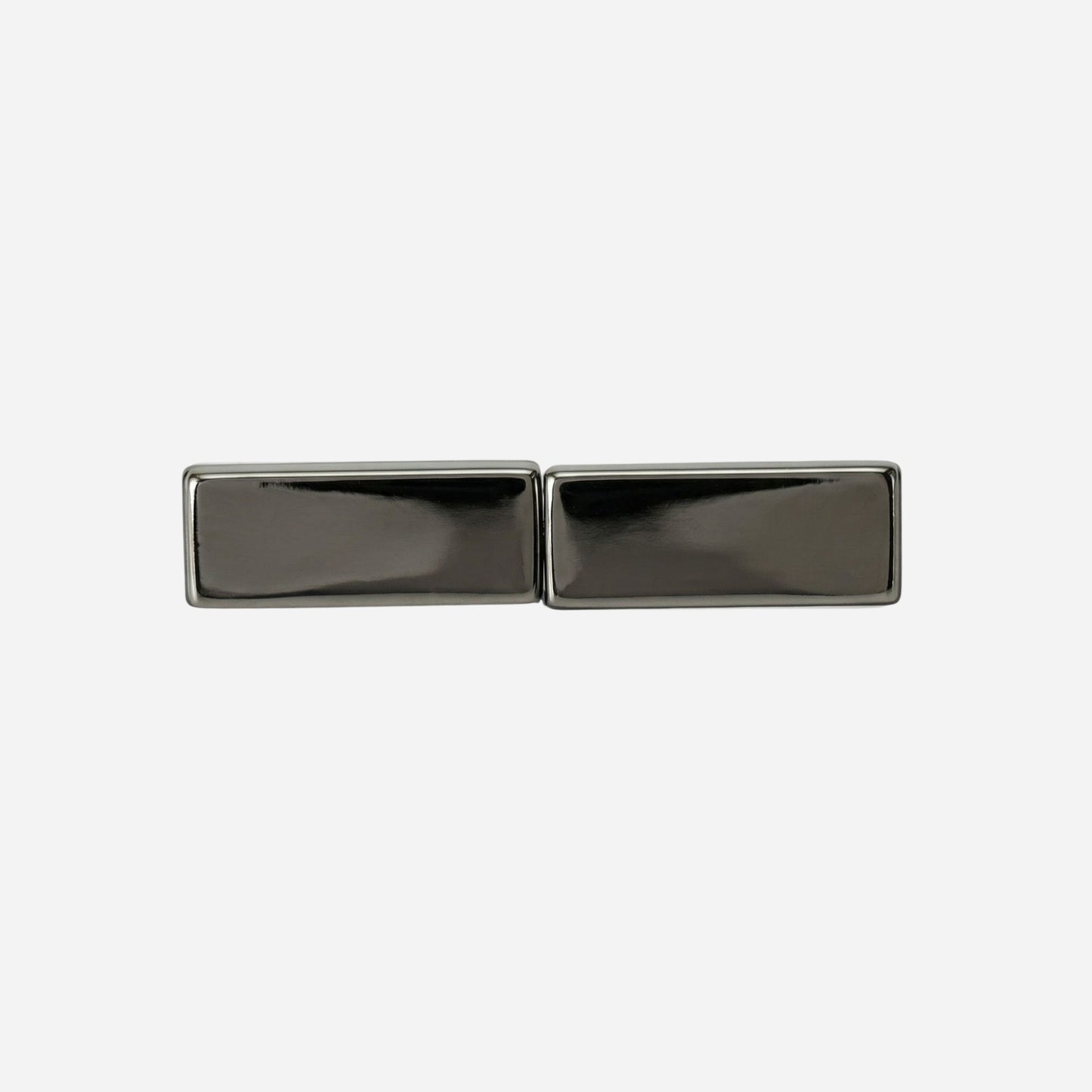Pair of silver rectangular cufflinks on a white background