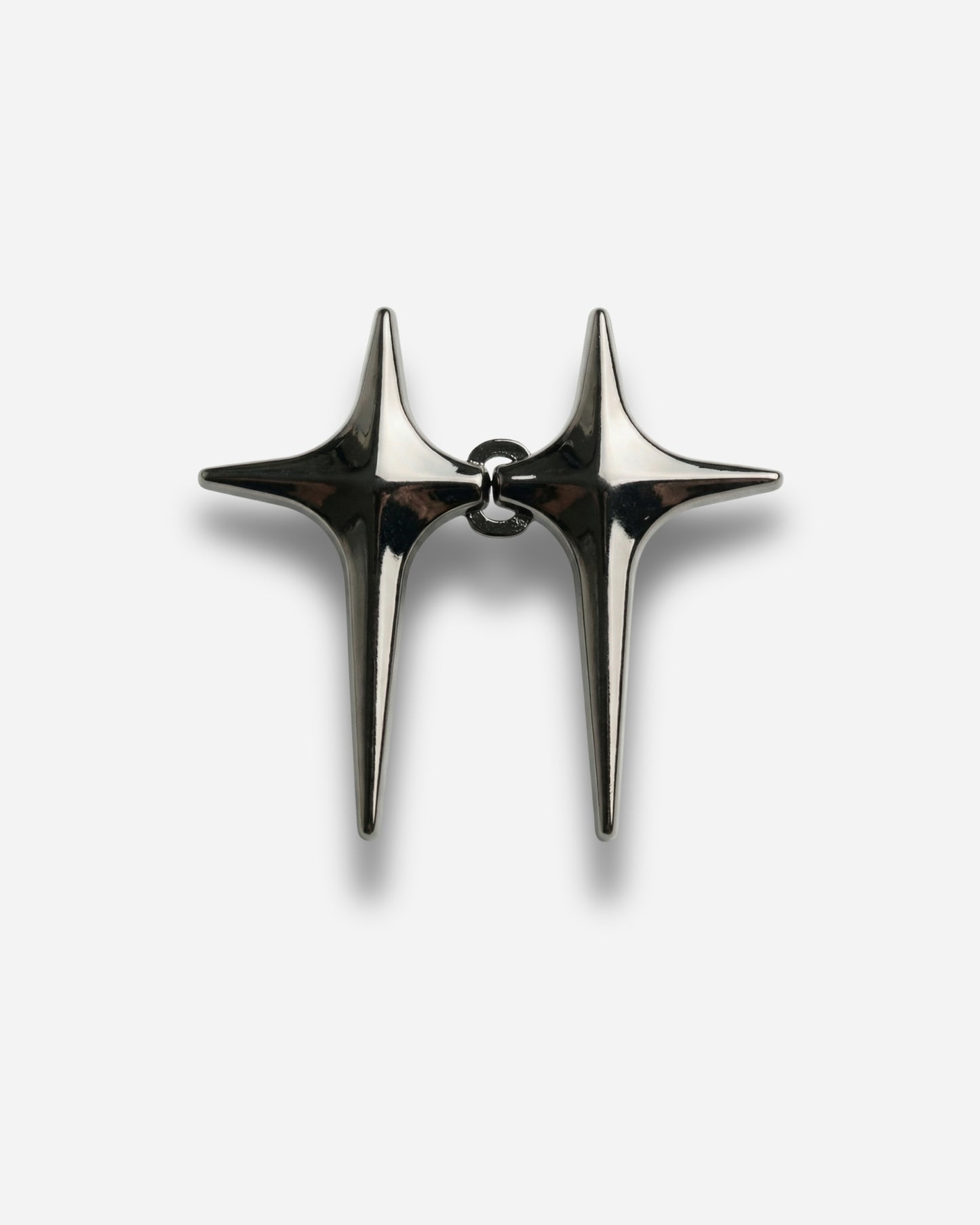 Two metallic star-shaped earrings connected by a small loop.