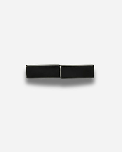 Two rectangular black objects on a plain white background