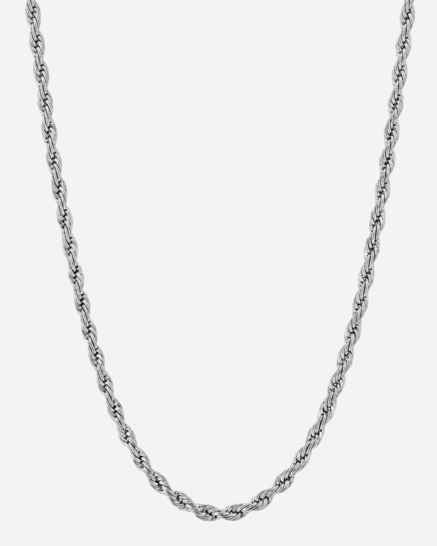 Silver twisted chain necklace on a plain background