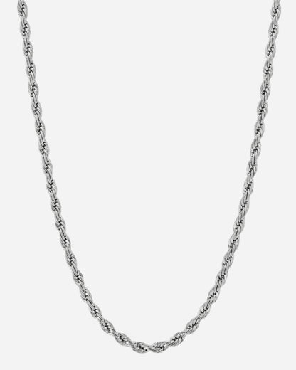 Silver twisted chain necklace on a plain background