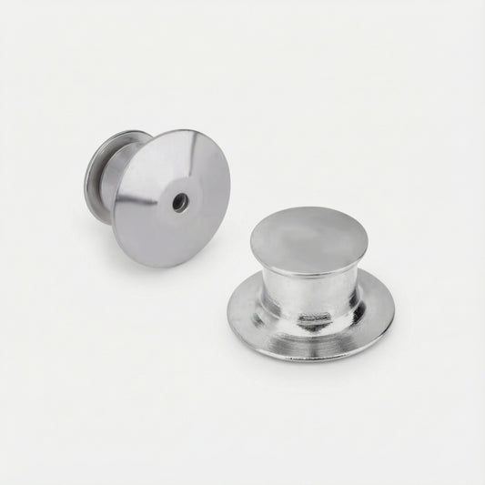 Two silver door handles on a white background