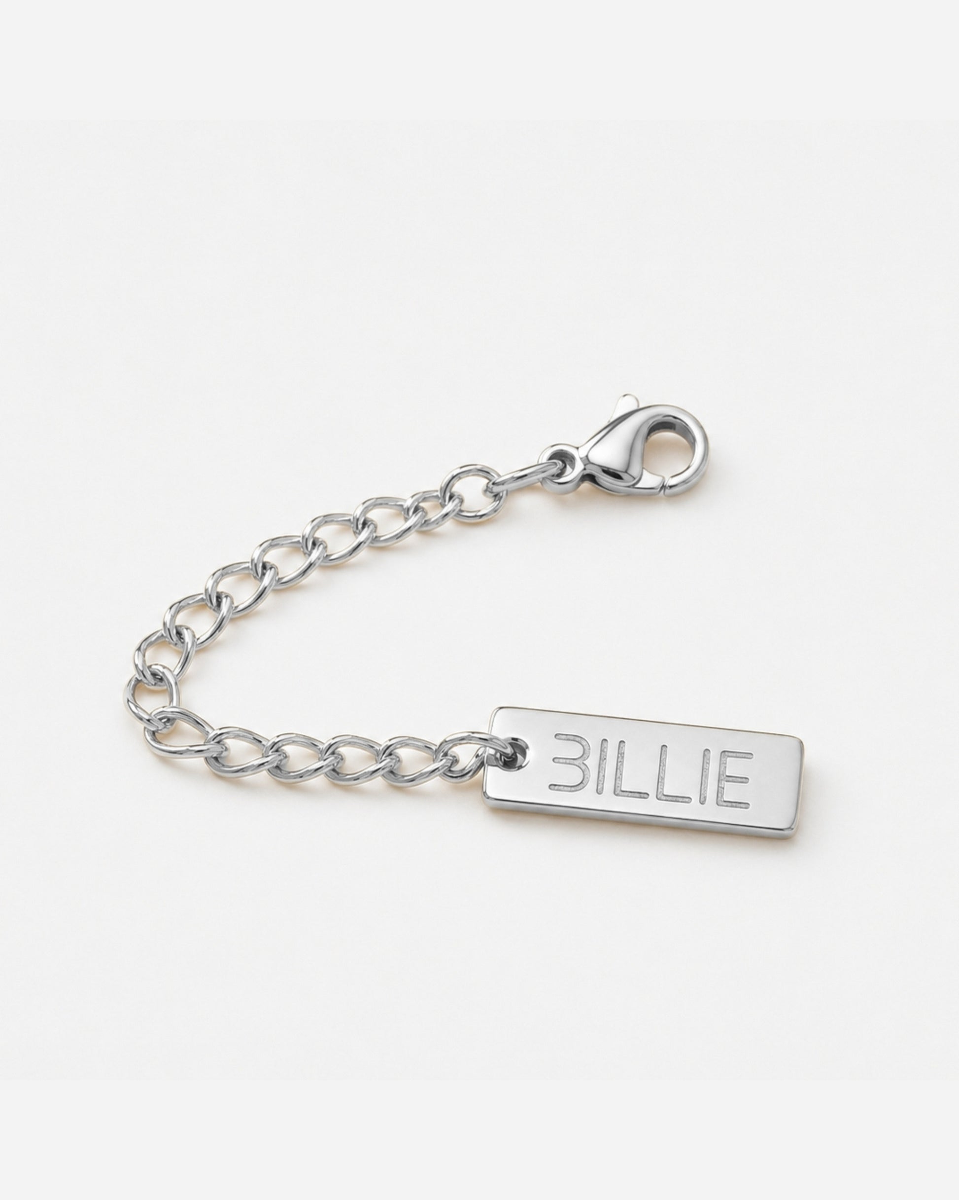 Silver chain with a rectangular tag engraved with the word 'BILLIE'.