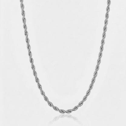 Silver rope chain necklace on a light gray background