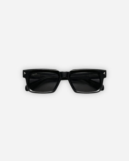 Black rectangular sunglasses on a plain background