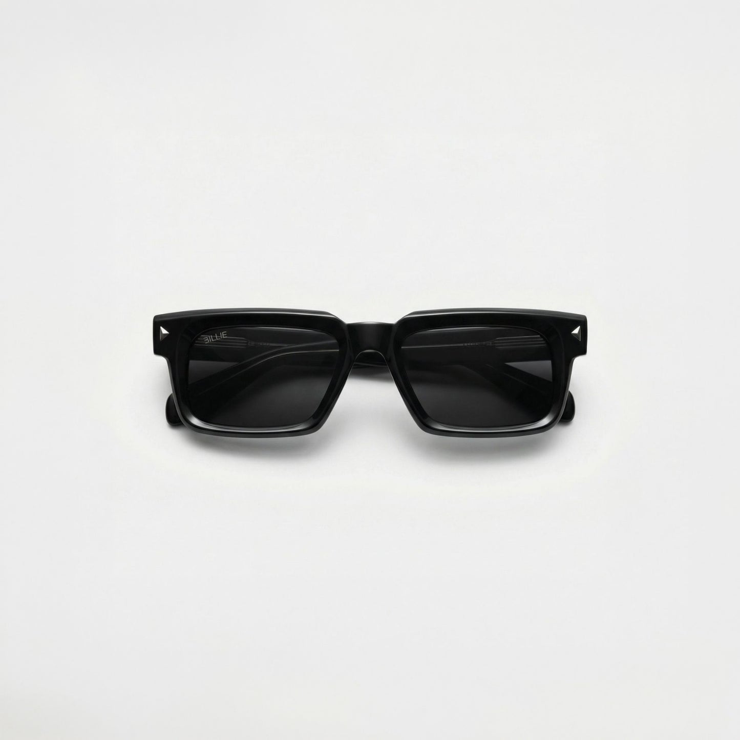 Billie Monarch Sunglasses with bold frame design on a light background
