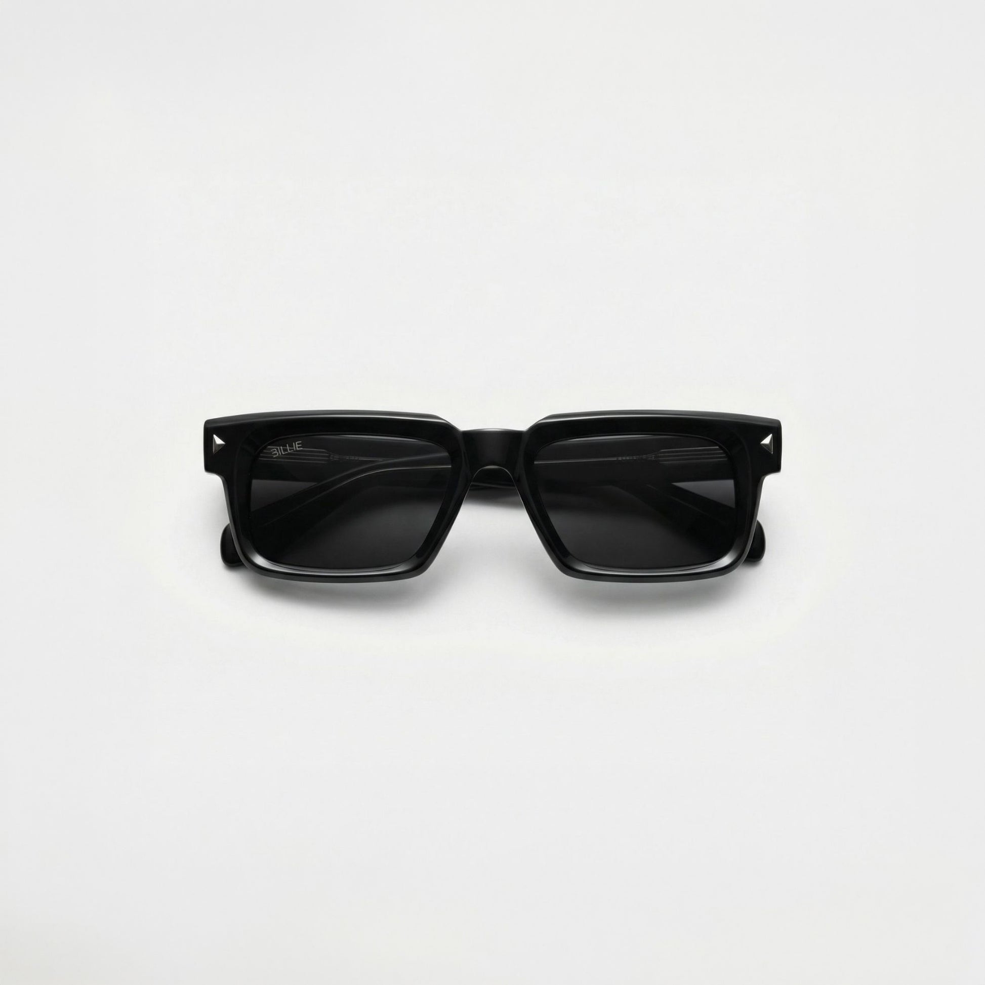 Billie Monarch Sunglasses with bold frame design on a light background