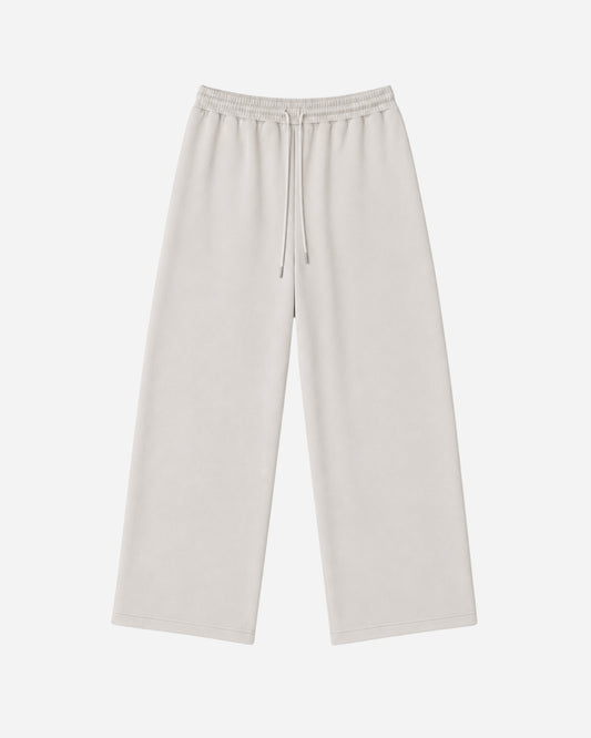 Light-colored wide-leg pants with an elastic waistband and drawstring.