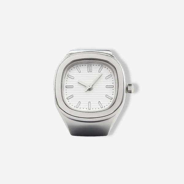 Silver ring watch with a white face on a light gray background