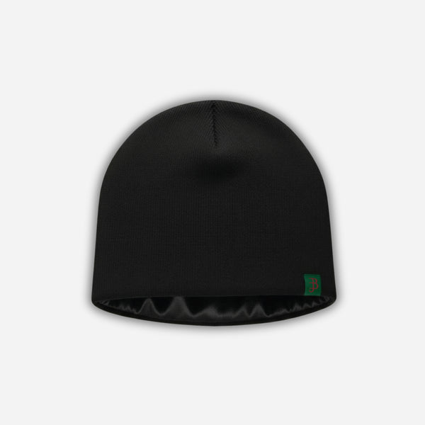 Black beanie with a logo on a light gray background