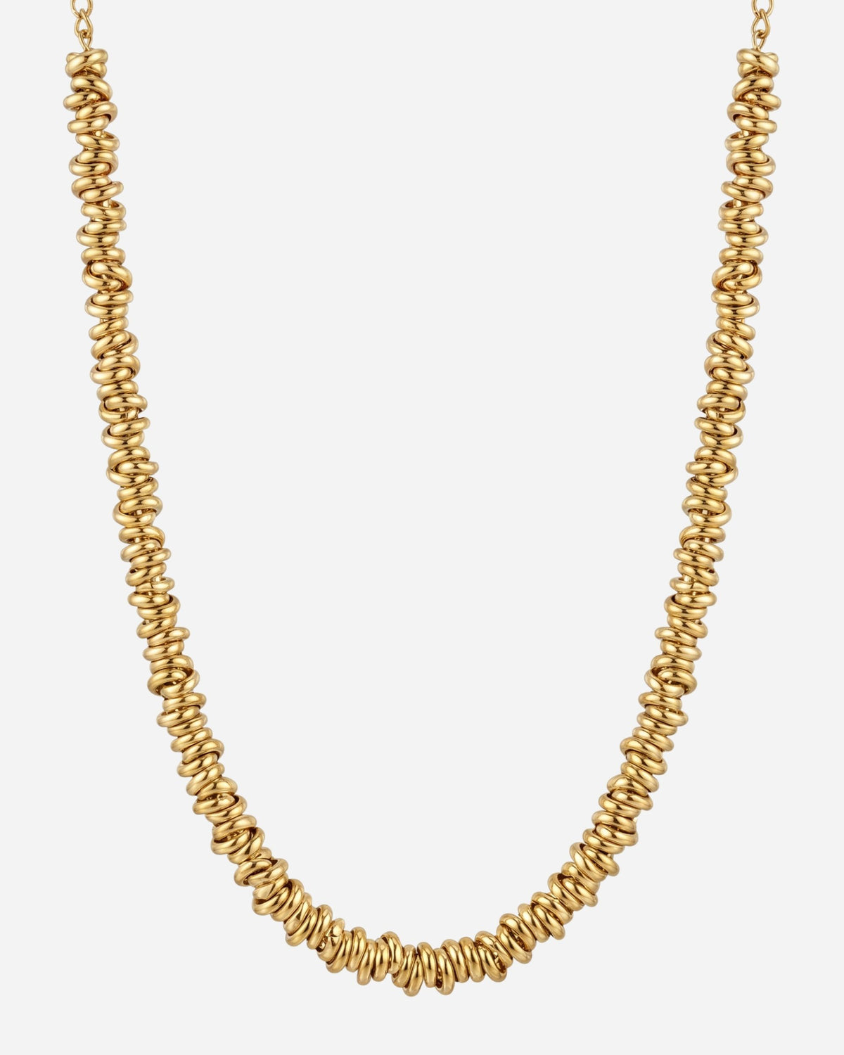 Billie Spring Chain 7mm in 18K gold plated stainless steel, coiled spring link necklace on a light background