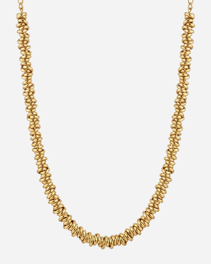 Billie Spring Chain 7mm in 18K gold plated stainless steel, coiled spring link necklace on a light background