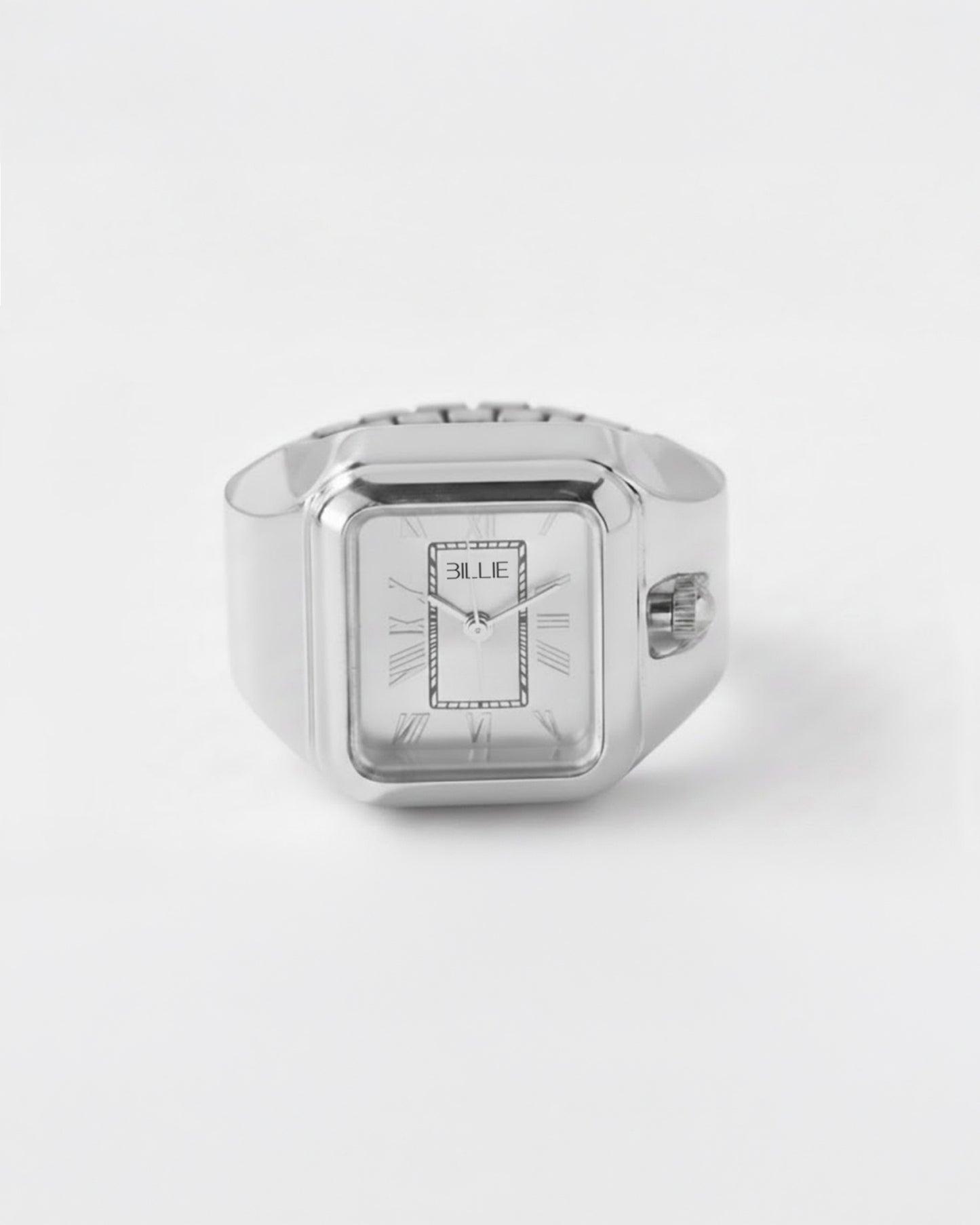 Silver rectangular watch with a white face and Roman numerals on a plain background.