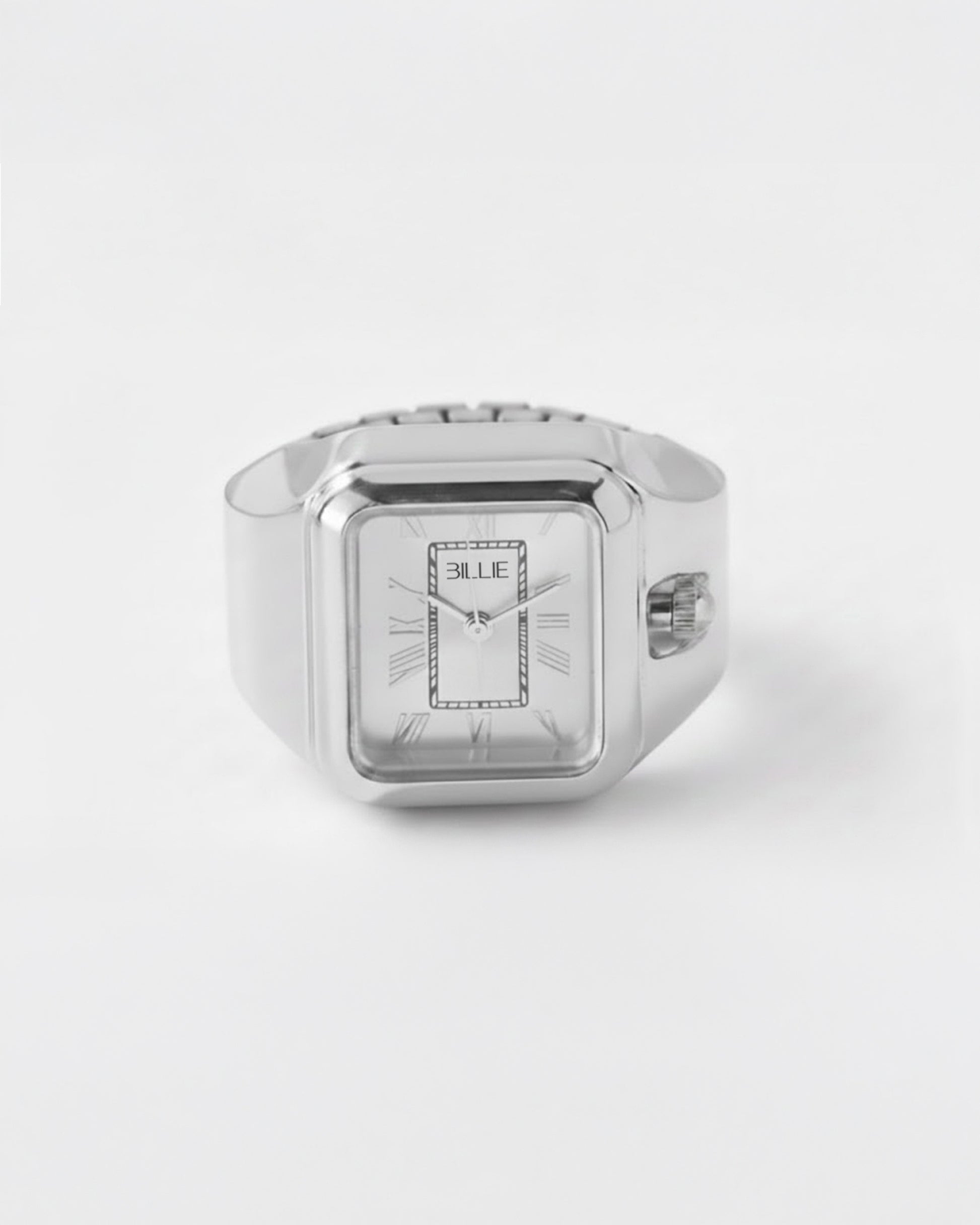 Silver rectangular watch with a white face and Roman numerals on a plain background.