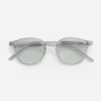 Clear frame Blue light glasses with reflective lenses on a white background