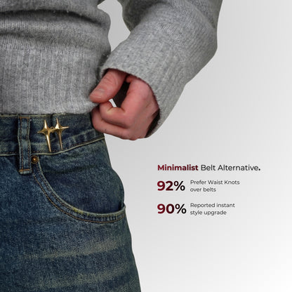 Person wearing jeans with waist knots and a gray sweater on a light gray background.