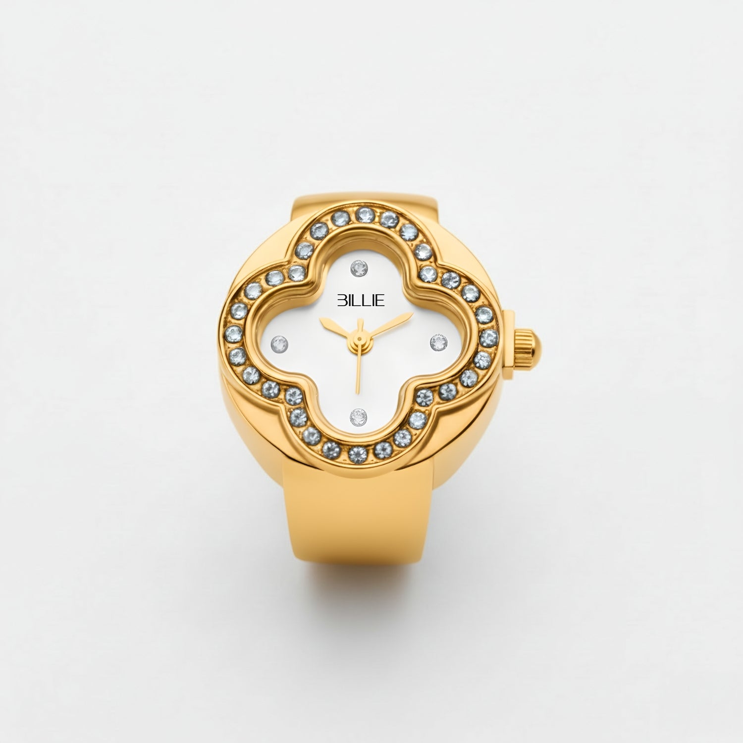 Gold watch with gemstone accents on a white background