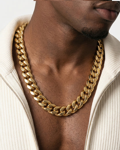 Close-up of a gold chain necklace worn around the neck