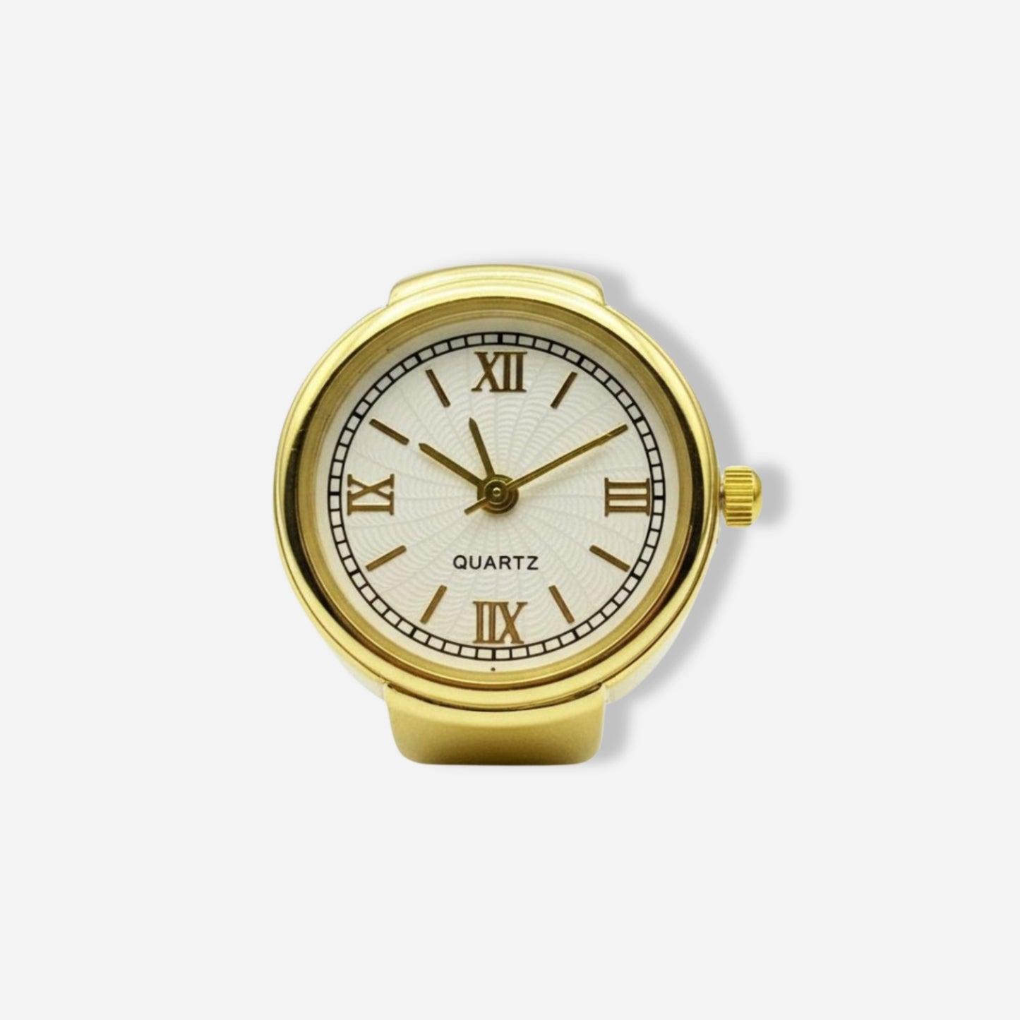 Gold ring watch with a white face and Roman numerals on a light gray background