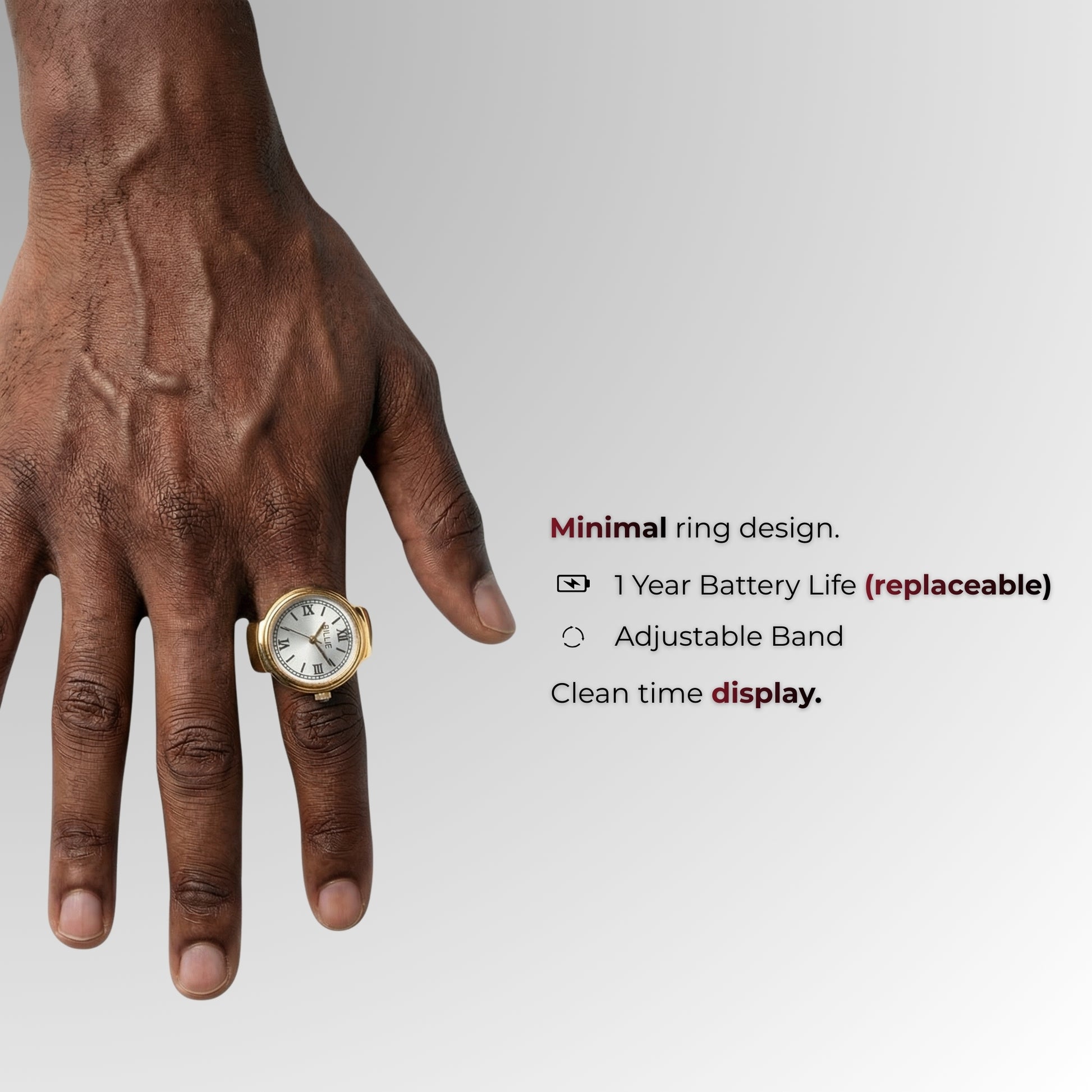 Gold ring with watch face on a hand against a gray background