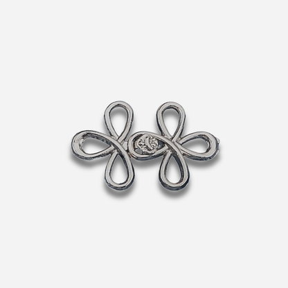 Gun black sculpted waist knot on a light gray background